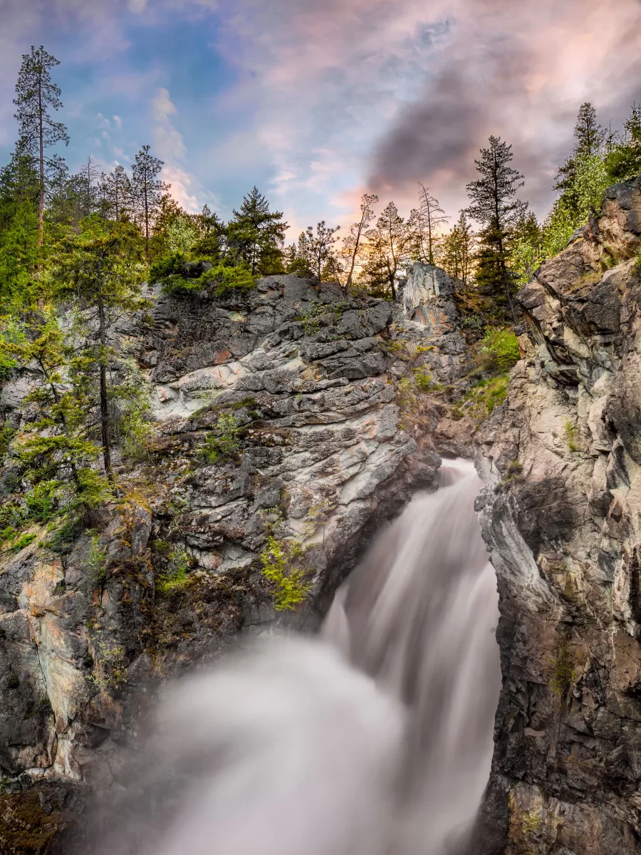 A gentle plume of mist rises above a rushing waterfall in Fintry Provincial Park, located between Kelowna and Vernon.
