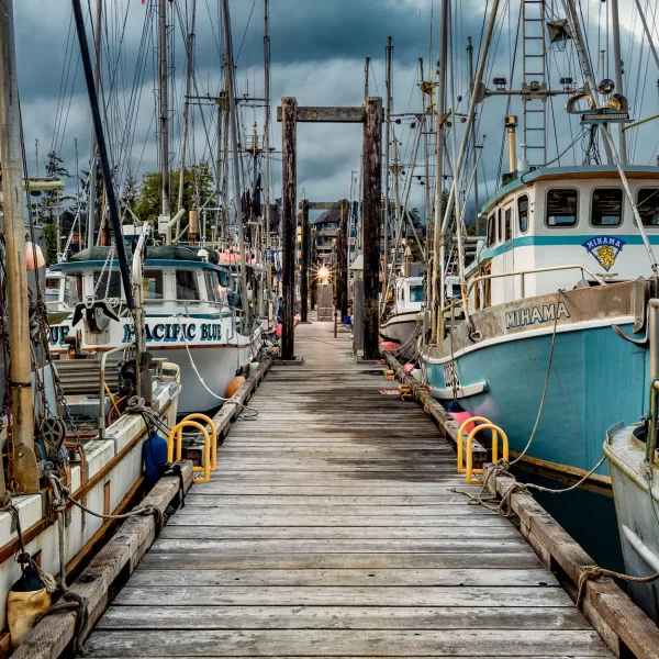 Fishing boats docked at a pier in Ucluelet, a seaside town on the west coast of Vancouver Island.